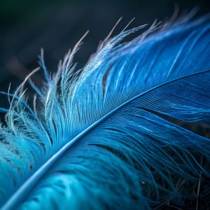 Close up macro photograph capturing the intricate details of a vibrant blue feather, highlighting its delicate barbules and central stem, creating a mesmerizing display of texture and color