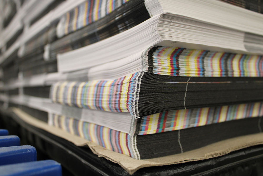 Folded offset press sheets close-up at Printing Partners in Indianapolis